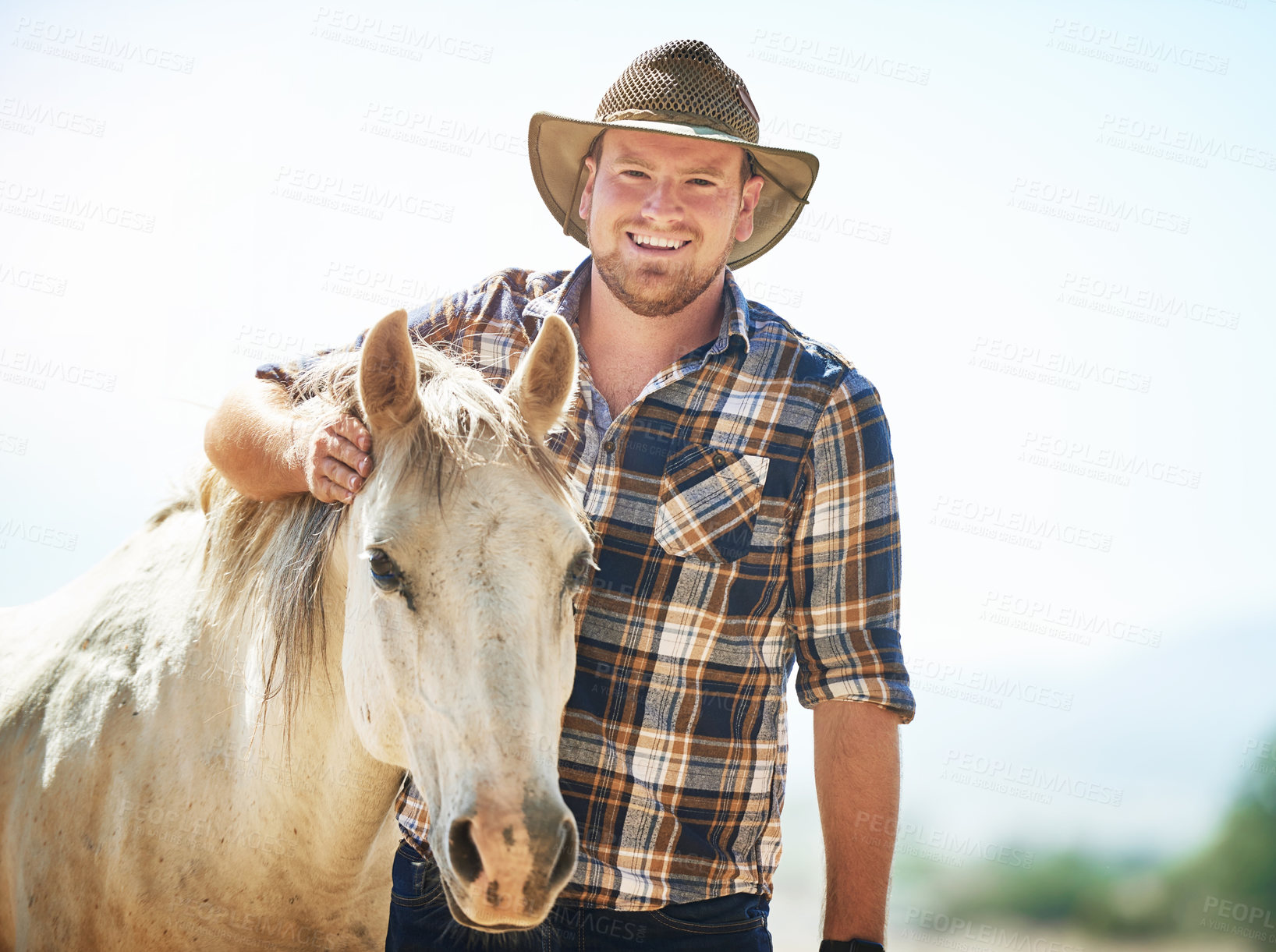 Buy stock photo Portrait, farmer and man with horse, summer and countryside with nature, happiness and smile. Environment, person and outdoor with guy, animal or equestrian with pet, joyful and cowboy with stallion