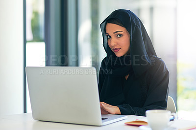 Buy stock photo Muslim, portrait and businesswoman working on a laptop for a career in dubai for a company. Woman, arab and professional is an entrepreneur on a computer for web design on a website for a job. 