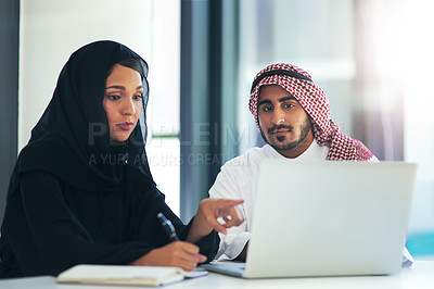 Buy stock photo Muslim, discussion and business people with laptop in office for consult, advice or client. Lens flare, hijab woman and man with keffiyeh for asset management, writing or meeting at Investment bank