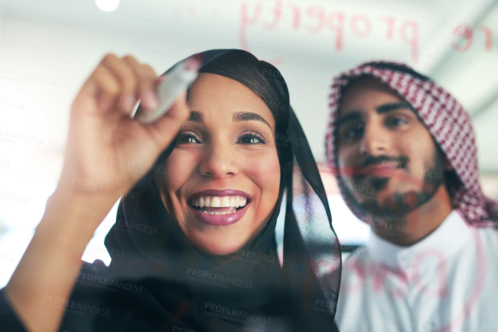 Buy stock photo Arab, business and people writing on glass, strategy and meeting for our vision or oil company financial plan. Muslim employee, development and collaboration, innovation and brainstorming in Dubai