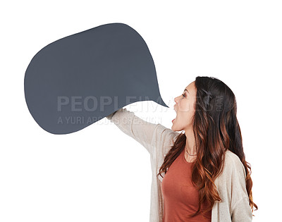 Buy stock photo Shot of a confident young woman posing with a speech bubble in studio