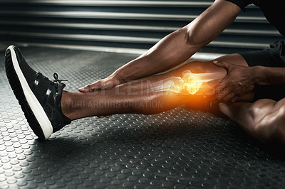 Buy stock photo Studio shot of an unrecognizable man examining a knee injury during his workout