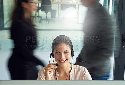 Buy stock photo Portrait of a call centre agent working in a busy office