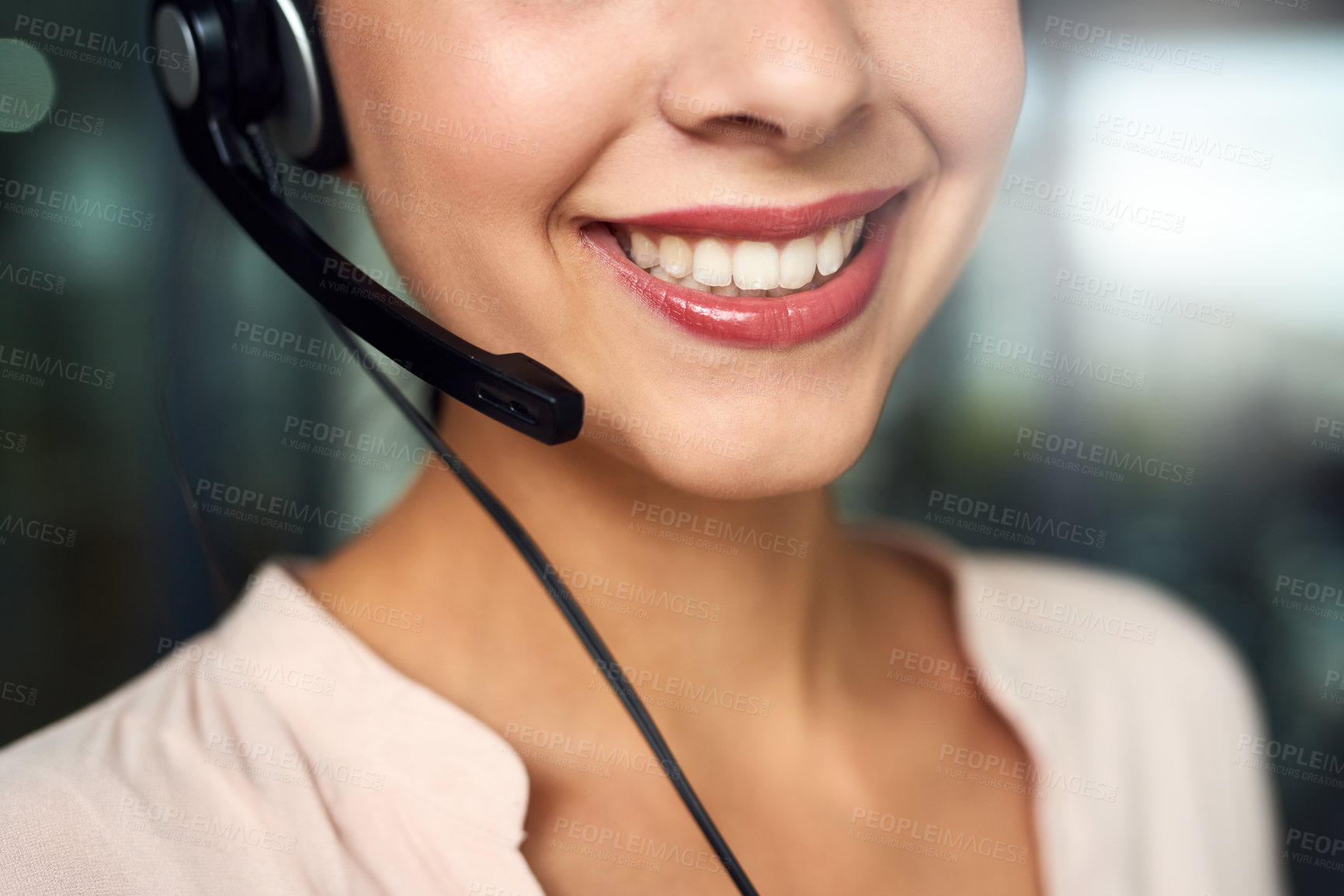 Buy stock photo Cropped shot of a young call centre agent working in an office