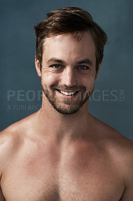 Buy stock photo Cropped portrait of a handsome young man against a grey background