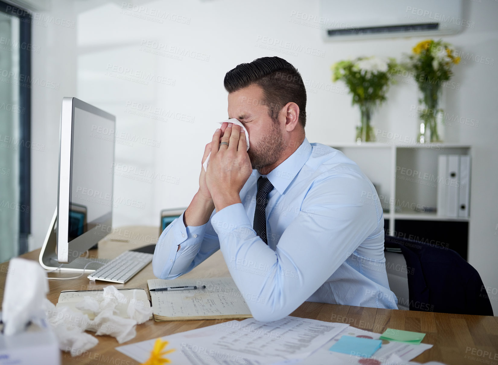 Buy stock photo Man, working and sick in office with tissue for healthcare, flu infection or FLiRT Covid. Male person, company or virus with nose cloth for bacteria, employee with allergy on laptop for medical