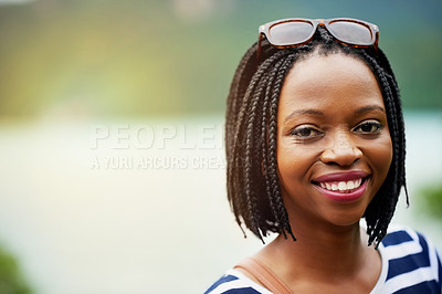 Buy stock photo Portrait of a smiling young woman standing outside in Thailand