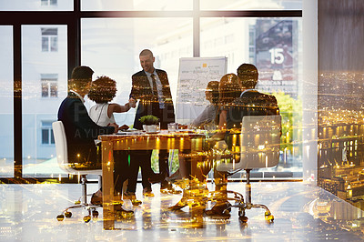 Buy stock photo Multiple exposure shot of two businesspeople shaking hands during a meeting superimposed over a cityscape