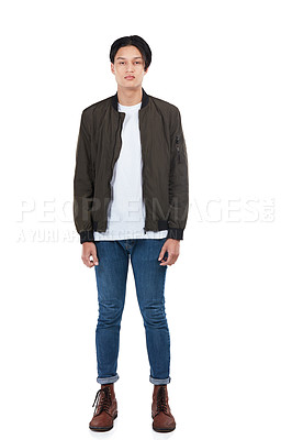 Buy stock photo Young man, serious portrait and cool fashion clothes for gen z or edgy millennial standing in white background studio. Male, full body and bored, stern and trendy focus with blank facial expression