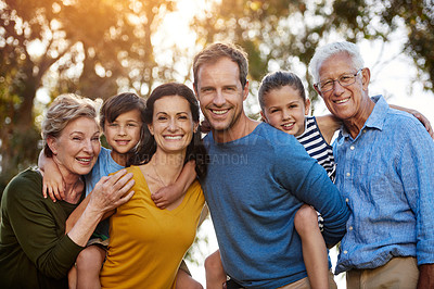 Buy stock photo Portrait, outdoor and family with love, smile and bonding with fun, caring and happiness together. Face, happy grandparents and mother with father, children and kids in nature, playful and loving