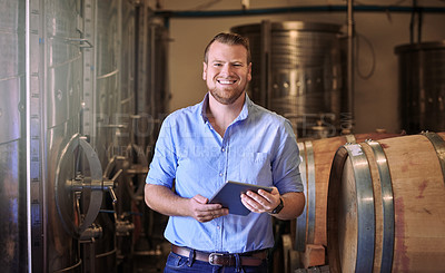 Buy stock photo Alcohol, man and portrait with tablet in brewery, inventory check or manufacturing for beer production with tech. Factory, manager or inspection with digital for search, barrel or business management