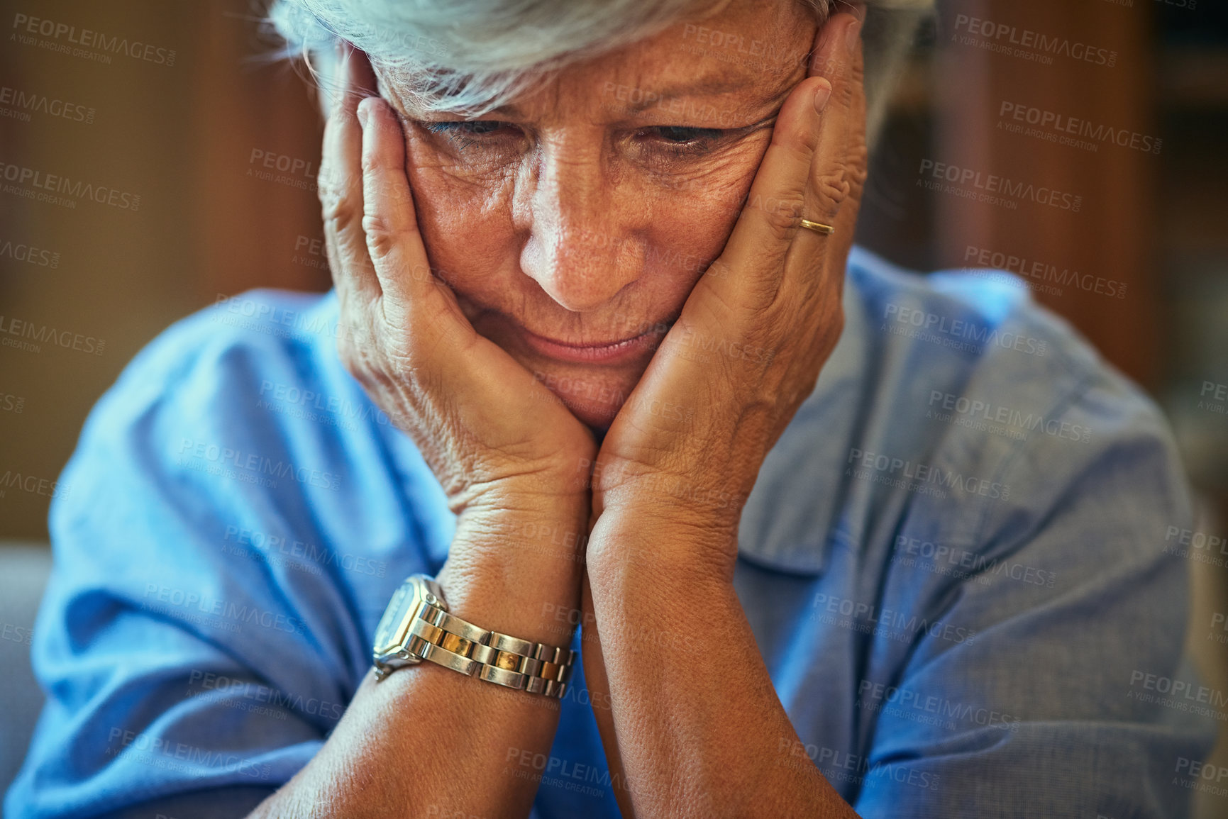 Buy stock photo Cropped shot of a senior woman looking worried