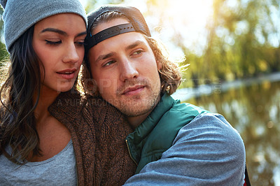 Buy stock photo Shot of a loving couple spending the day outdoors