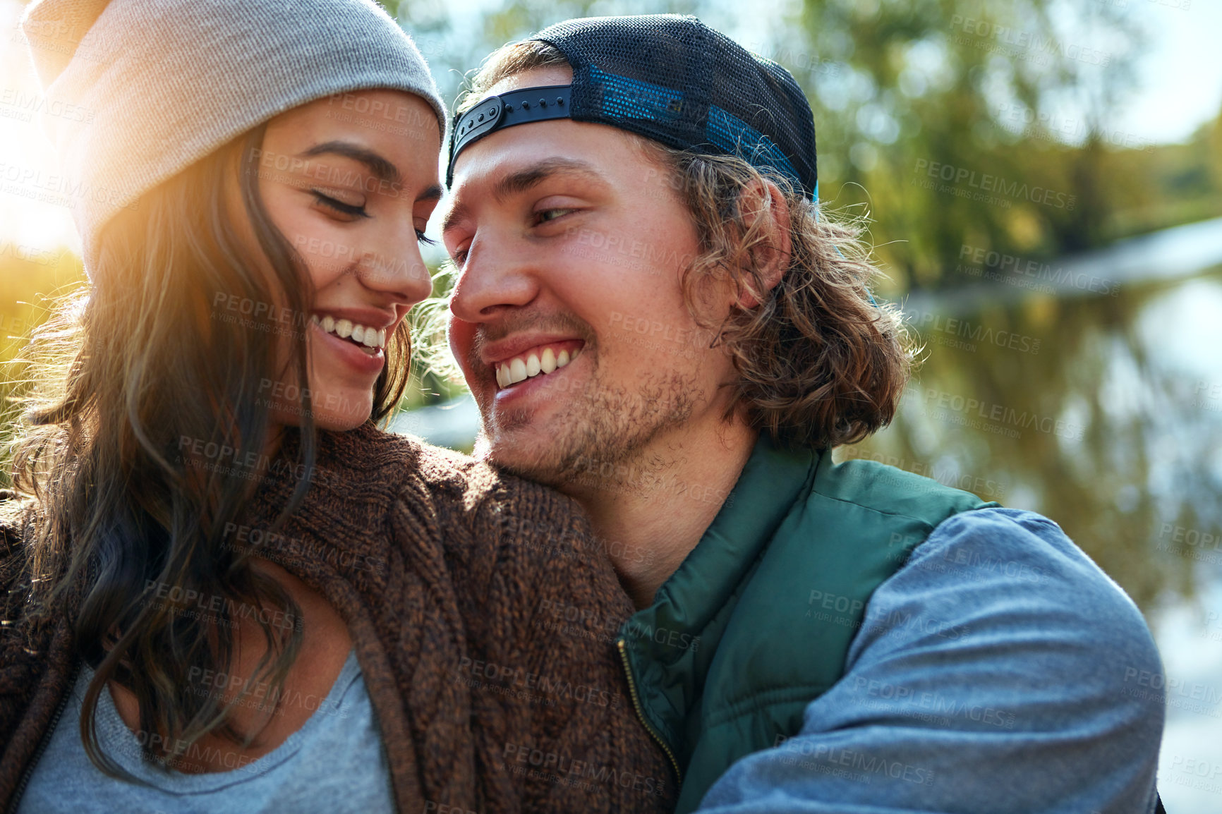 Buy stock photo Shot of a loving couple spending the day outdoors