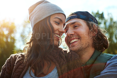 Buy stock photo Shot of a loving couple spending the day outdoors