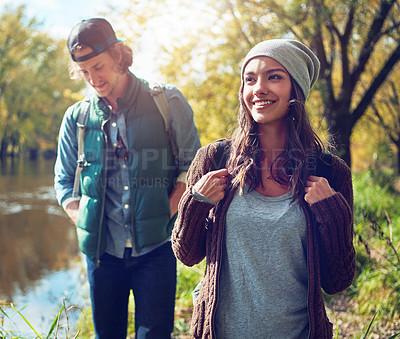 Buy stock photo Cropped shot of an affectionate young couple spending a day in nature