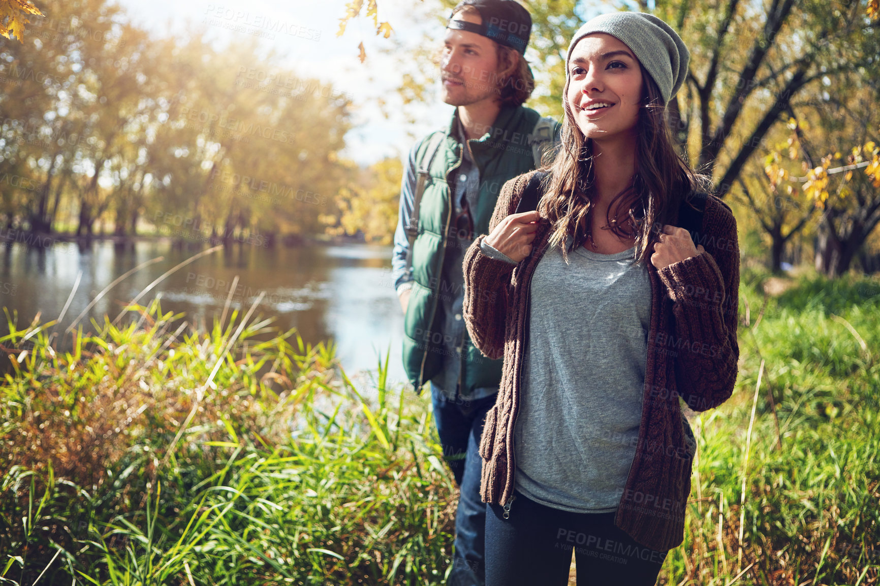 Buy stock photo Cropped shot of an affectionate young couple spending a day in nature