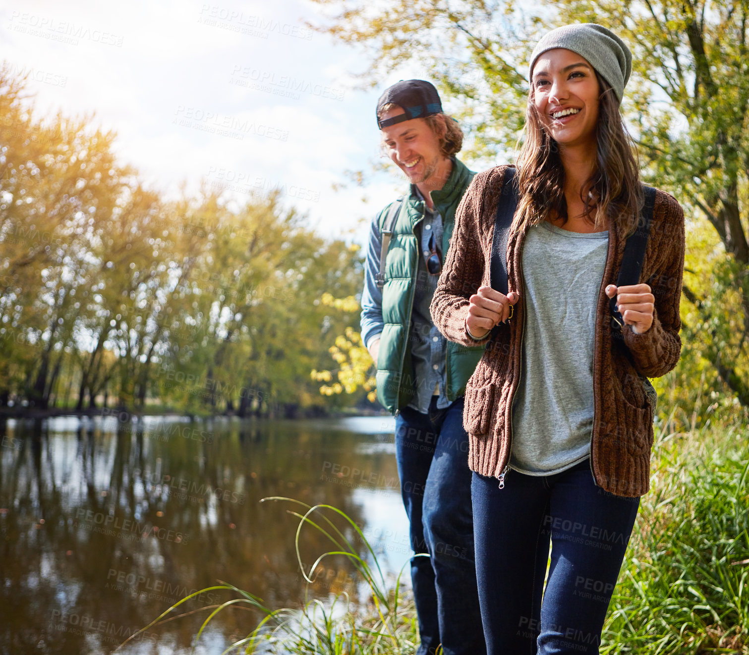 Buy stock photo Cropped shot of an affectionate young couple spending a day in nature