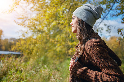 Buy stock photo Cropped shot of an attractive young woman spending a day in nature