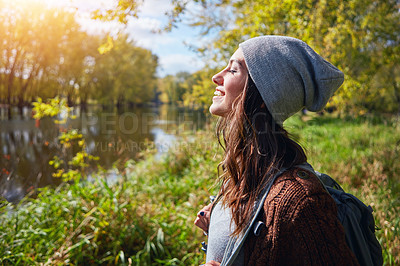 Buy stock photo Cropped shot of an attractive young woman spending a day in nature