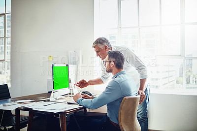 Buy stock photo Cropped shot of a mature businessman getting assistance from a colleague in the office