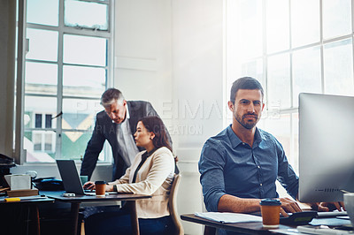 Buy stock photo Portrait, office and business man by computer in company workplace. Pc, typing and serious male employee ready for working on marketing report, advertising proposal or sales project with colleagues.