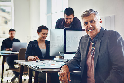 Buy stock photo Senior, portrait and business man in office or company workplace. Leadership, ceo and happy elderly male employee working on marketing report, advertising or sales project with coworkers in company.