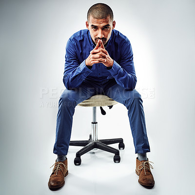 Buy stock photo Portrait, serious and solution with business man in studio for ambition, inspiration or opportunity. Idea, mission and office chair with employee on white background for agency or career development