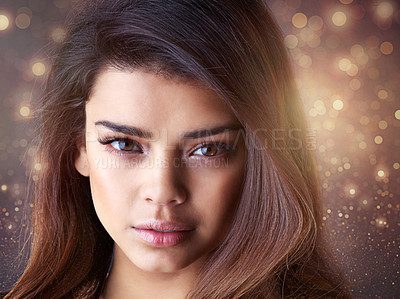 Buy stock photo Studio shot of a beautiful young woman posing in the studio