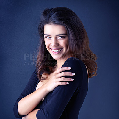 Buy stock photo Studio shot of a beautiful young woman posing in the studio