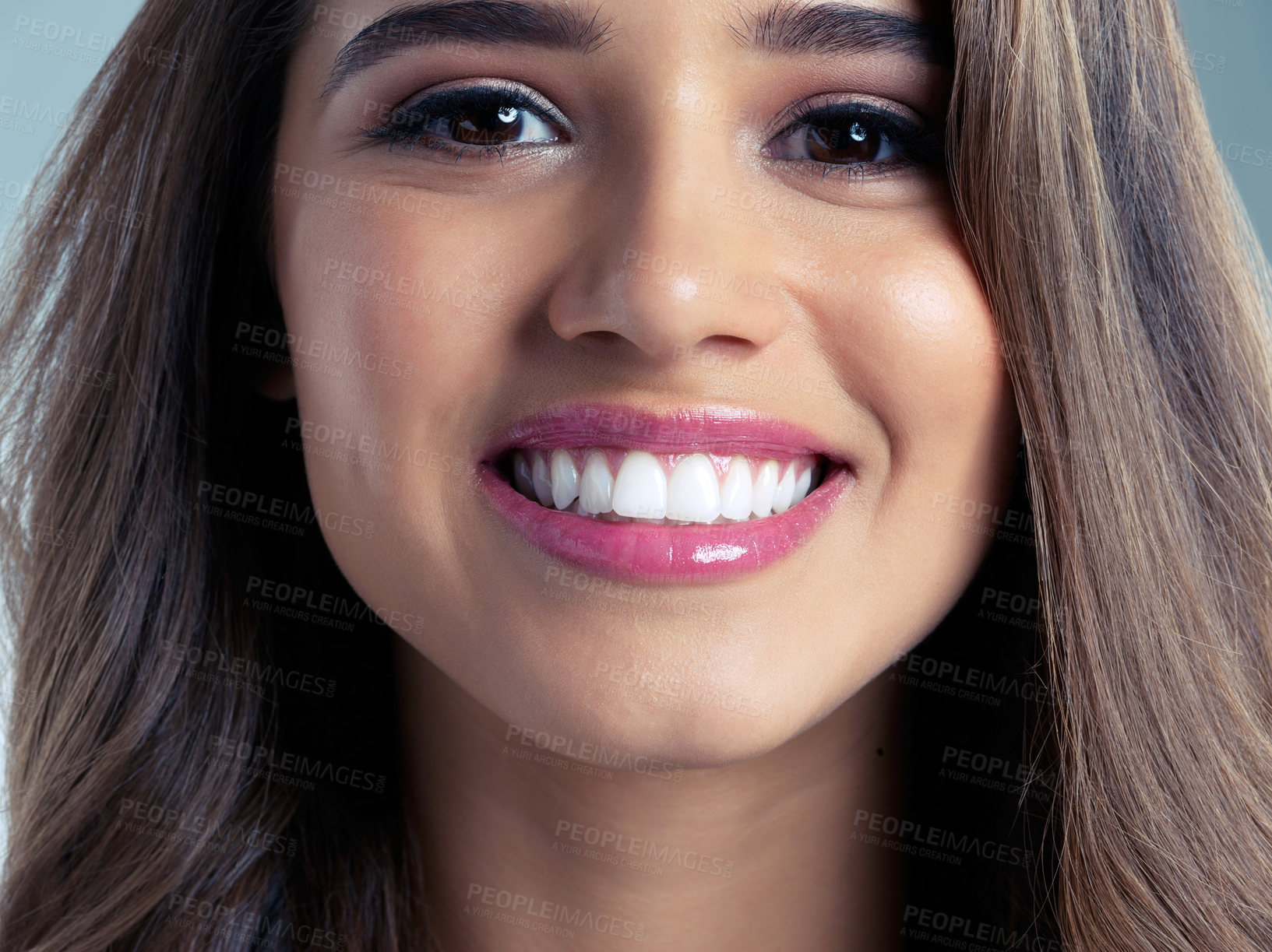 Buy stock photo Skincare, smile and teeth with portrait of woman in studio on blue background for aesthetic wellness. Beauty, cosmetics and face with happy model at salon for dermatology or vitamin c treatment