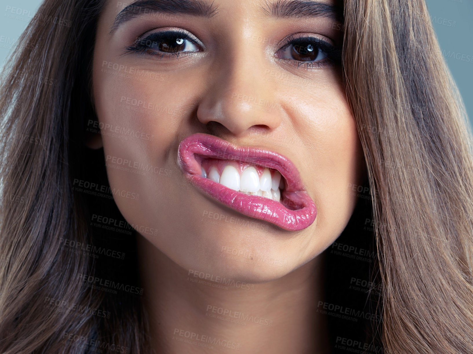 Buy stock photo Beauty, funny face and lips with portrait of woman in studio on blue background for aesthetic wellness. Comedy. cosmetics and mouth with silly model at salon for dermatology or goofy expression