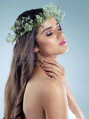 Buy stock photo Woman, hand and flower crown for beauty, skincare and organic for wellness on white background. Smile, plant and natural cosmetics for female model person, studio and makeup for facial product