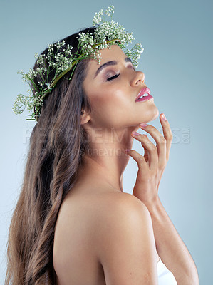 Buy stock photo Woman, hand and flower crown for beauty, skincare and organic for wellness on white background. Luxury, plant and natural cosmetics for female model person, studio and grooming for facial product