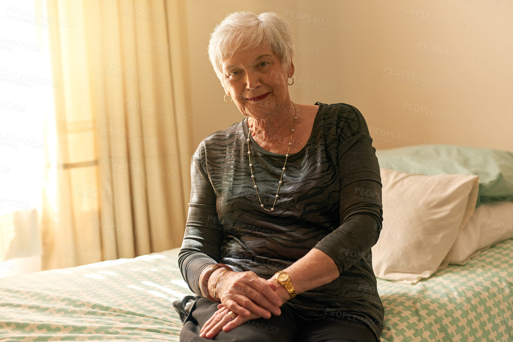 Buy stock photo Portrait of a contented senior woman posing in her bedroom at home