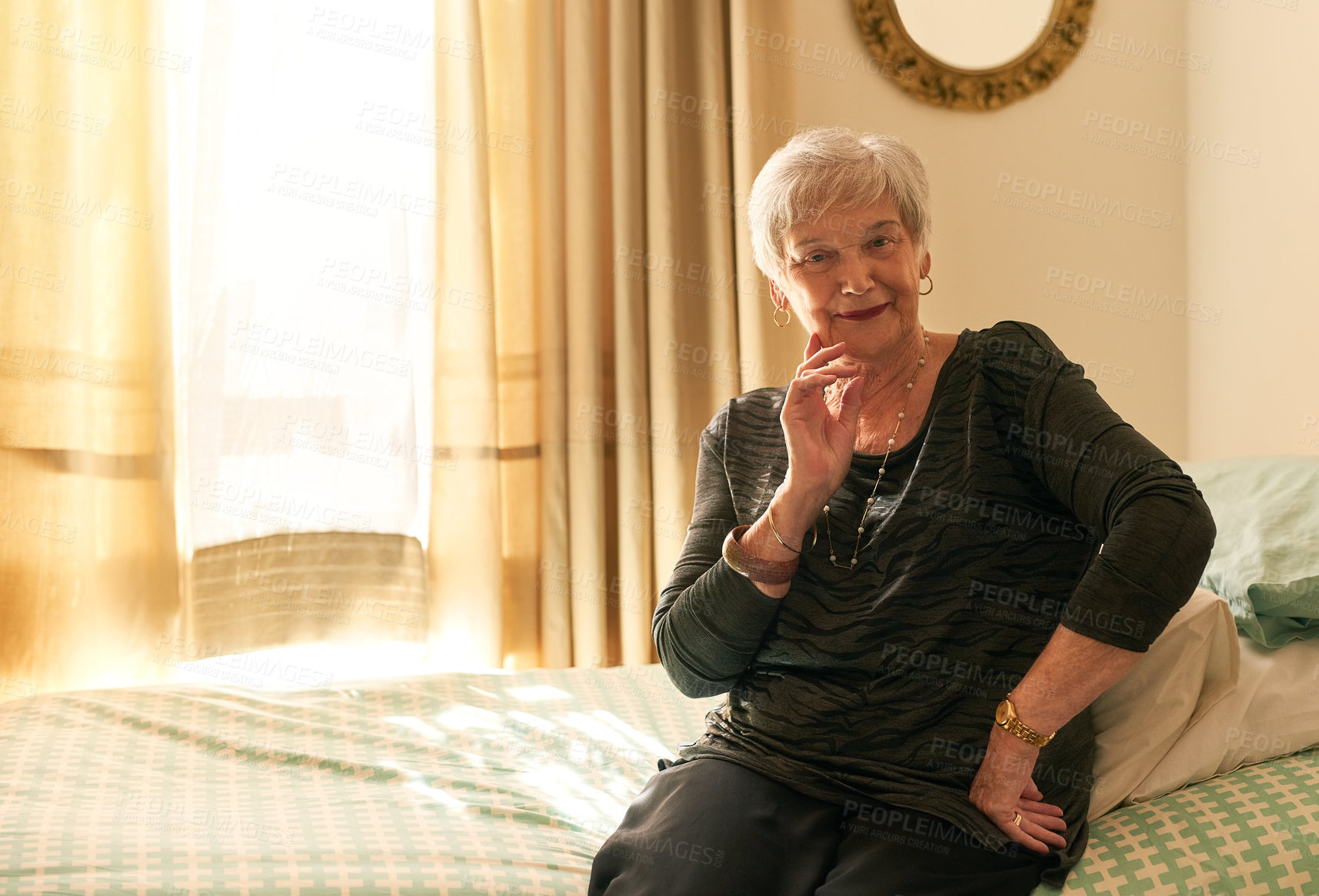 Buy stock photo Portrait of a contented senior woman posing in her bedroom at home