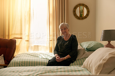 Buy stock photo Elderly woman, portrait and sitting in bedroom with smile for retirement, wellness and confidence for fashion. Senior lady, happy and style inspiration in nursing home with ethical brand for clothes