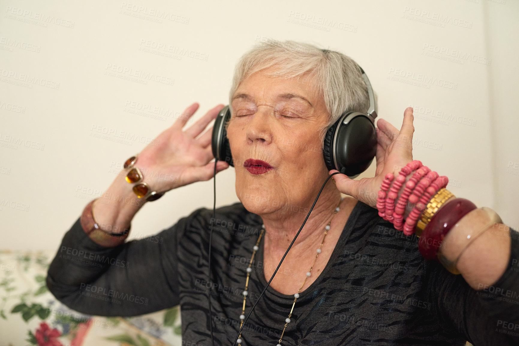 Buy stock photo Senior woman, relax and headphones in house with music for retirement, audio playlist and streaming for online radio. Elderly lady, happy and listening to sound in home with excited for hear podcast