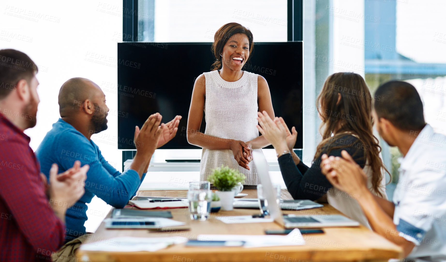 Buy stock photo Cropped shot of a young female designer giving a presentation in the boardroom