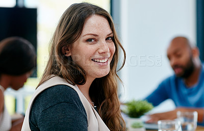 Buy stock photo Portrait of a young female designer sitting in the boardroom during a meeting