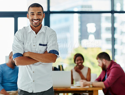 Buy stock photo Cropped portrait of a handsome young male designer standing in the office