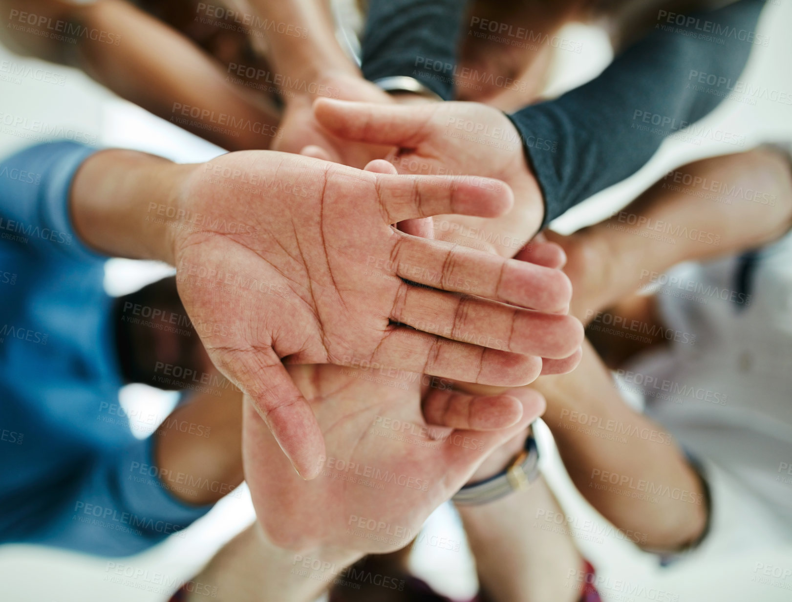 Buy stock photo Business people, hands and stack for team building in office, support and collaboration. Staff, creative agency and low angle for community in company, solidarity and pile together for sales mission