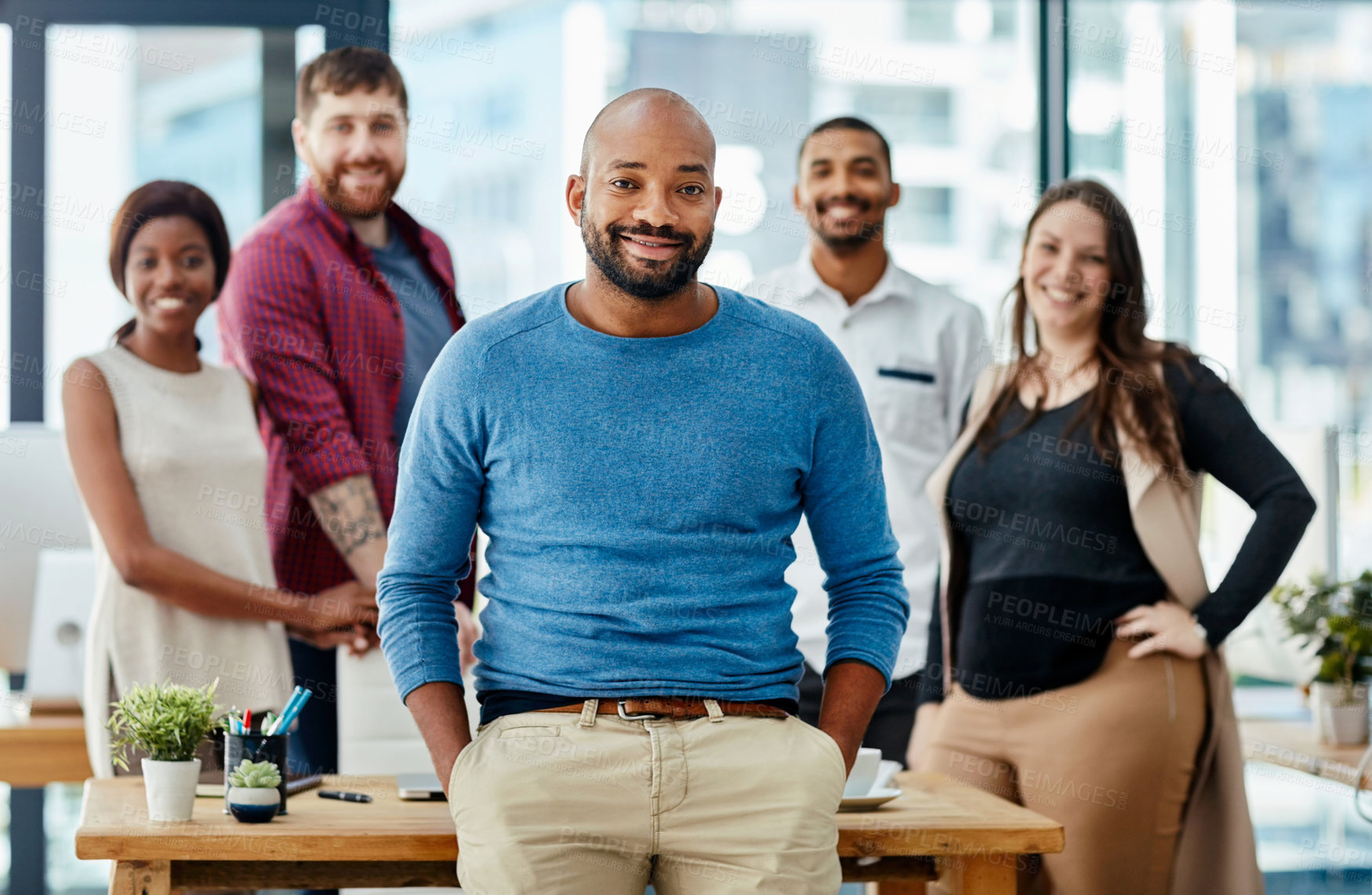 Buy stock photo Businessman, leadership and portrait in workplace for project, management and development. Diversity, team of designers and happy together in office for collaboration and global company in New York