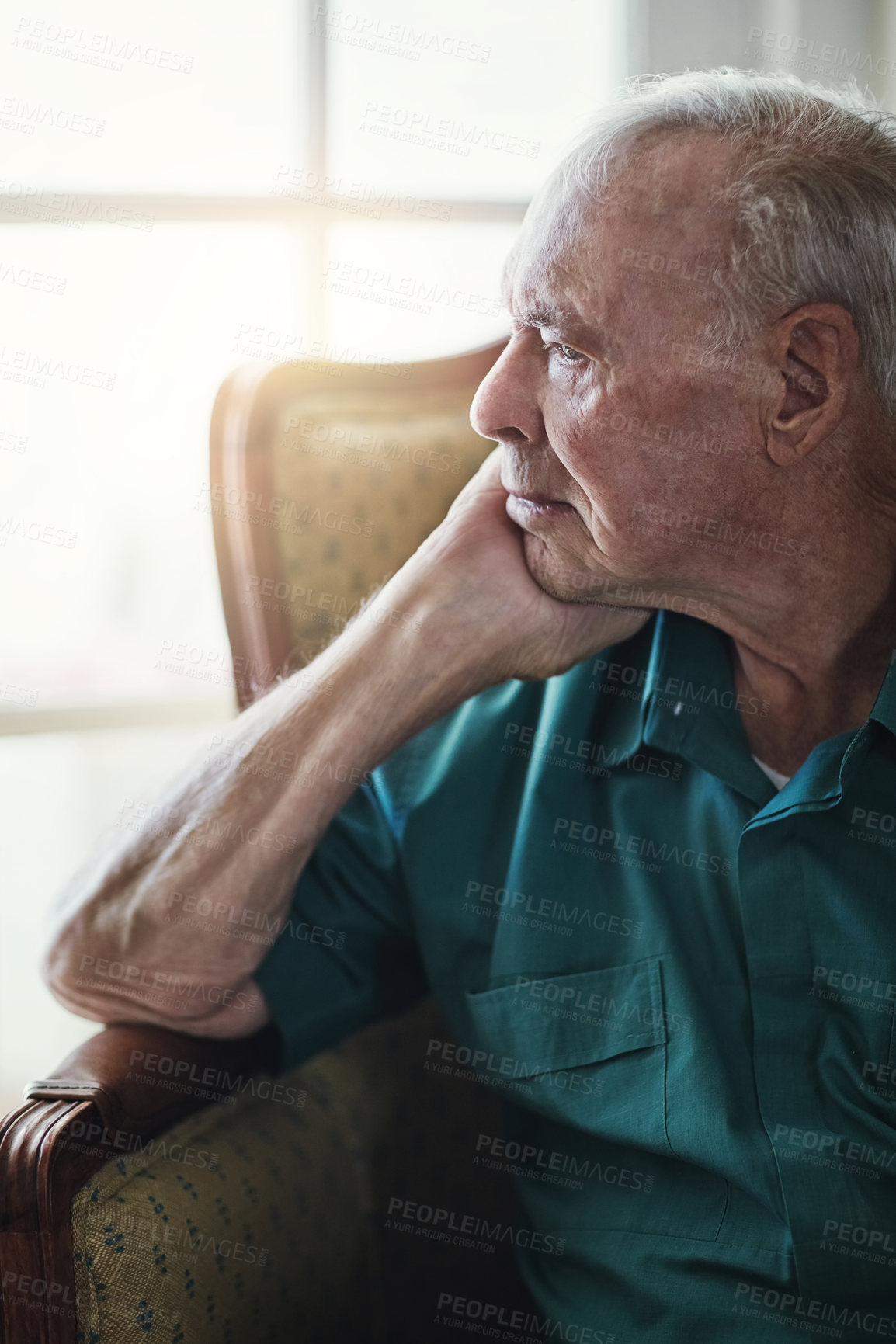 Buy stock photo Elderly, man and sad with thinking of memory in retirement home with remember, nostalgia and reflection on sofa. Senior, person and lonely with alzheimers, depression or thoughtful on couch in lounge