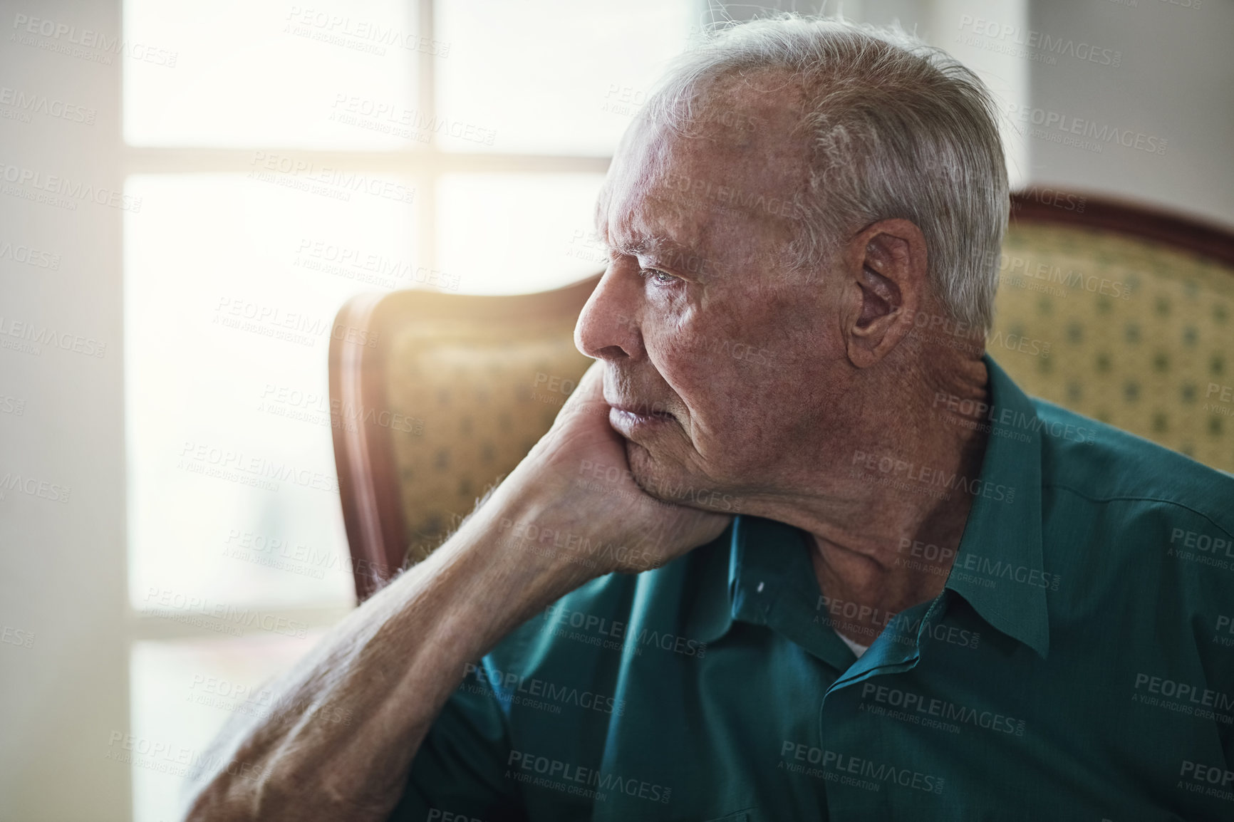 Buy stock photo Elderly, man and sad with thinking of memory in retirement home with remember, nostalgia or reflection on sofa. Senior, person and lonely with alzheimers, depression and thoughtful on couch in lounge