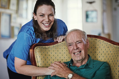 Buy stock photo Shot of a female nurse standing next to her senior patient