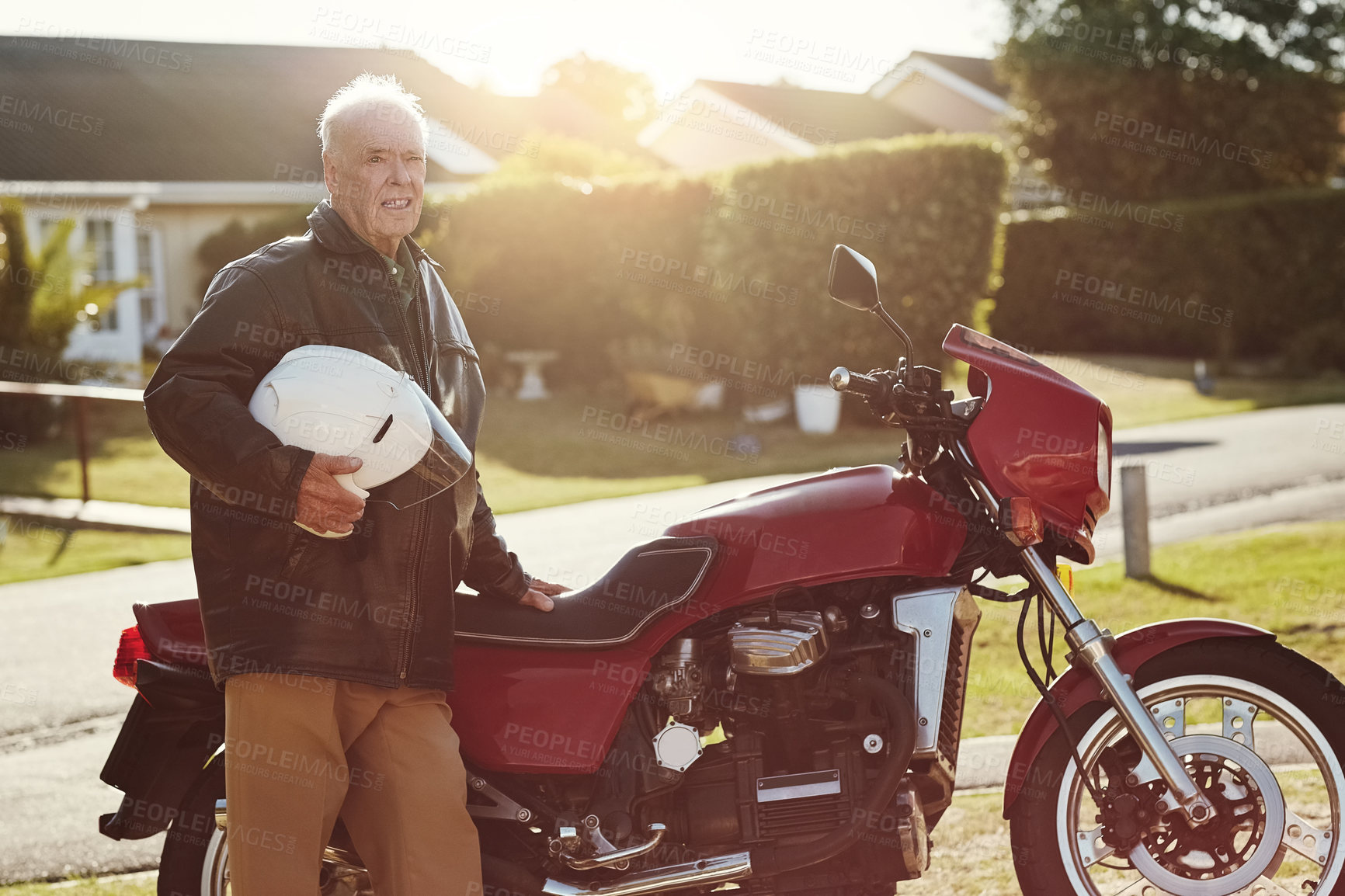 Buy stock photo Travel, helmet and senior man with motorcycle in a street for holiday, adventure and morning commute outdoor. Vehicle, transport and elderly male biker with motorbike for neighborhood, fun or drive