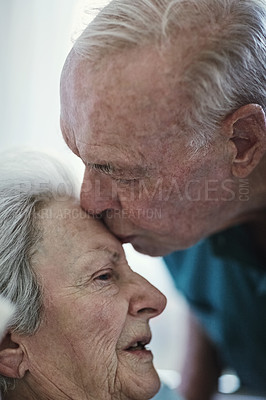 Buy stock photo Elderly, kiss and couple in hospital for healthcare, visiting sick patient and hope for recovery. Clinic, senior man and woman kissing on forehead with love, care and empathy, kindness and comfort.