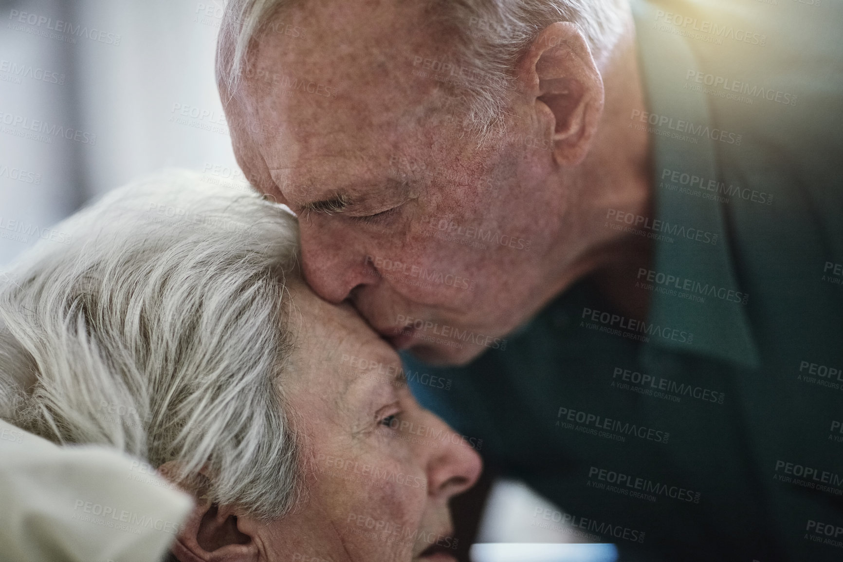 Buy stock photo Shot of a senior man visiting his wife in hospital