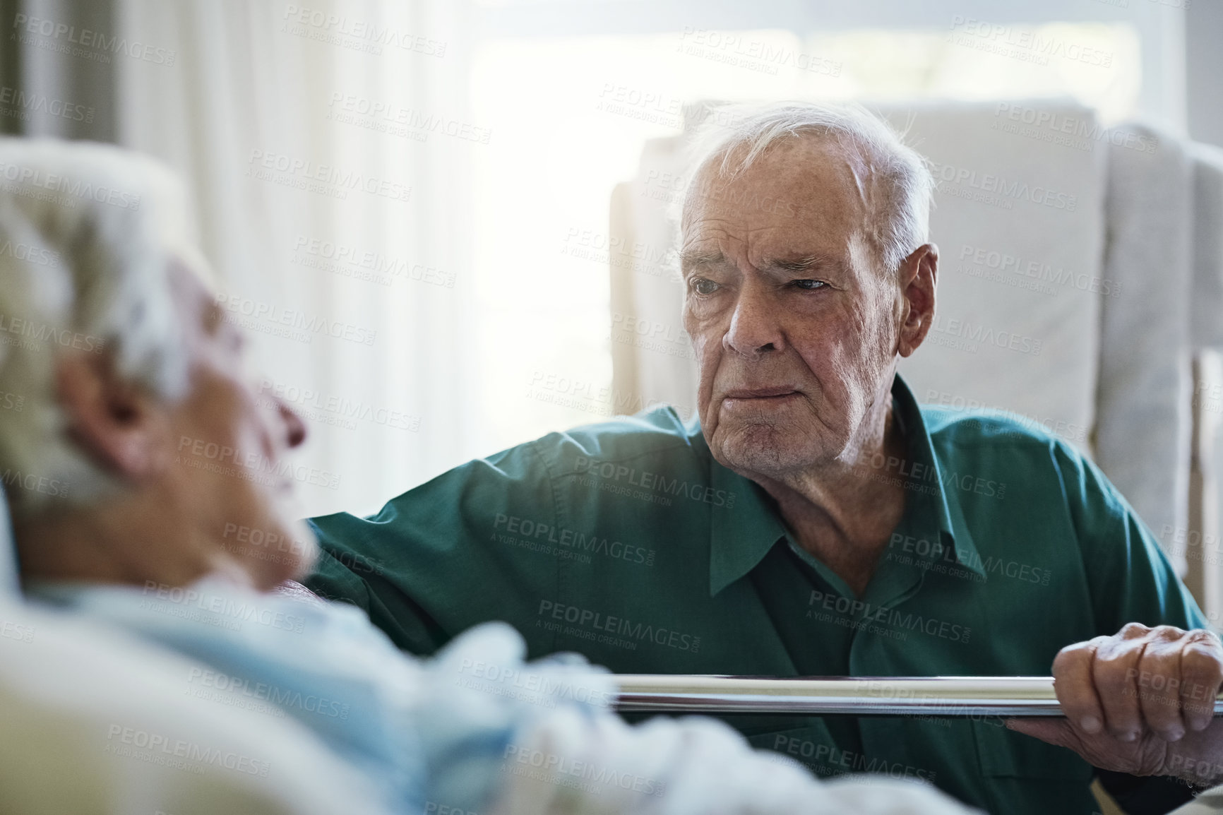 Buy stock photo Shot of a senior man visiting his wife in hospital